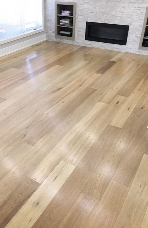 Rafraîchissement de planchers de bois préhuilés